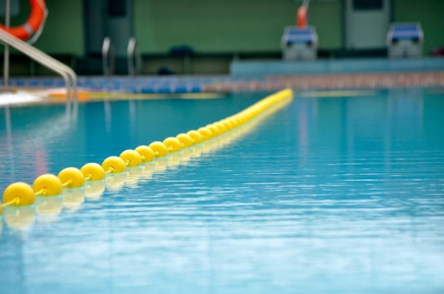 yellow inflatable ring on YMCA swimming pool